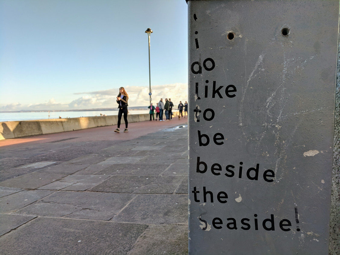 "I do like to be beside the seaside" written on the wall in Portobello