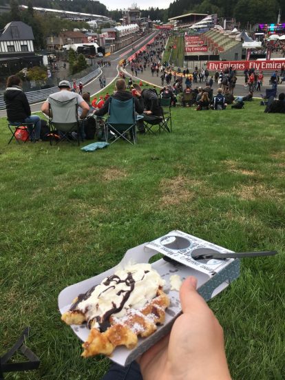 Alex eating her waffle on Eau Rouge