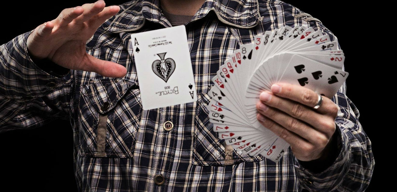 Magician performing a card trick