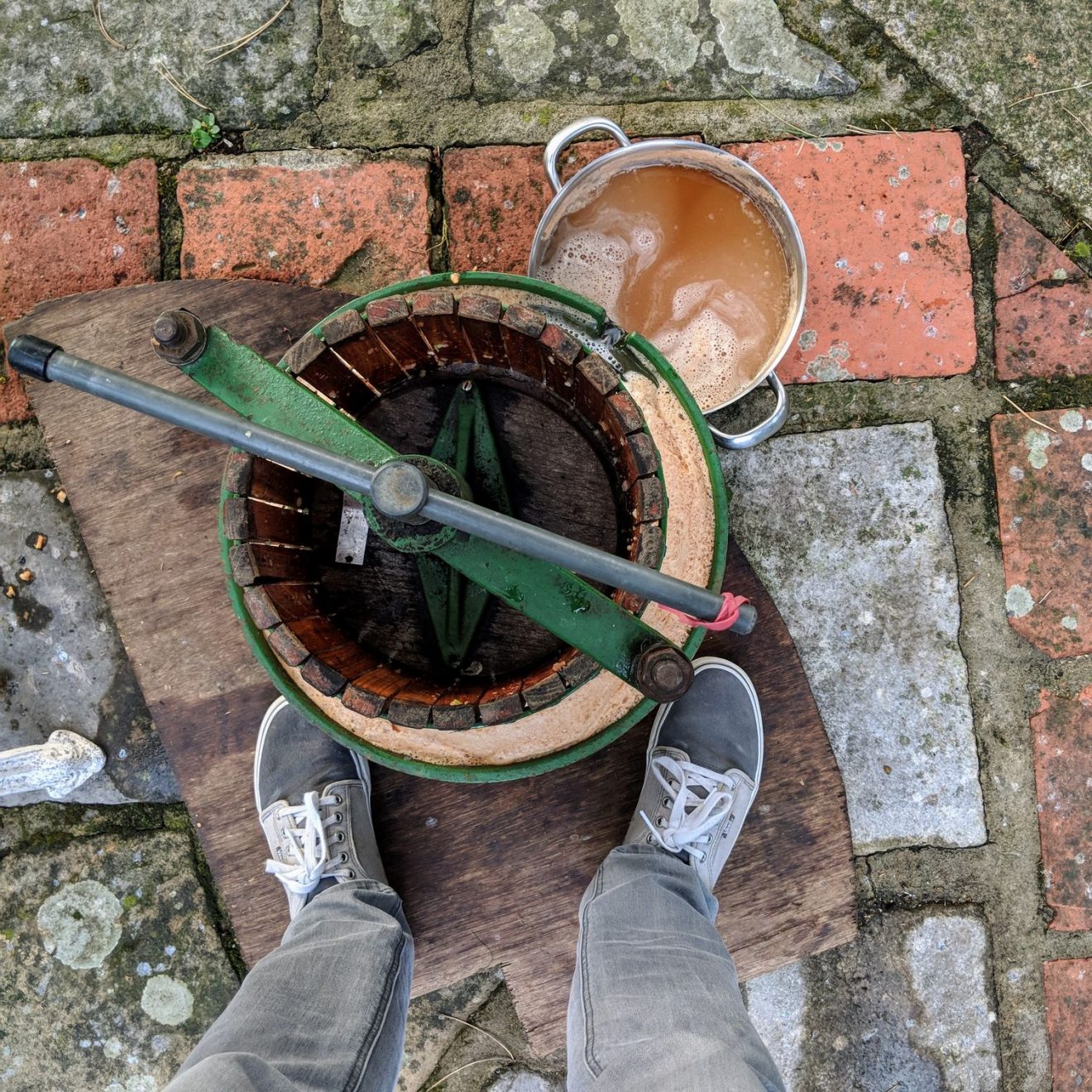 Me pressing apples to make juice