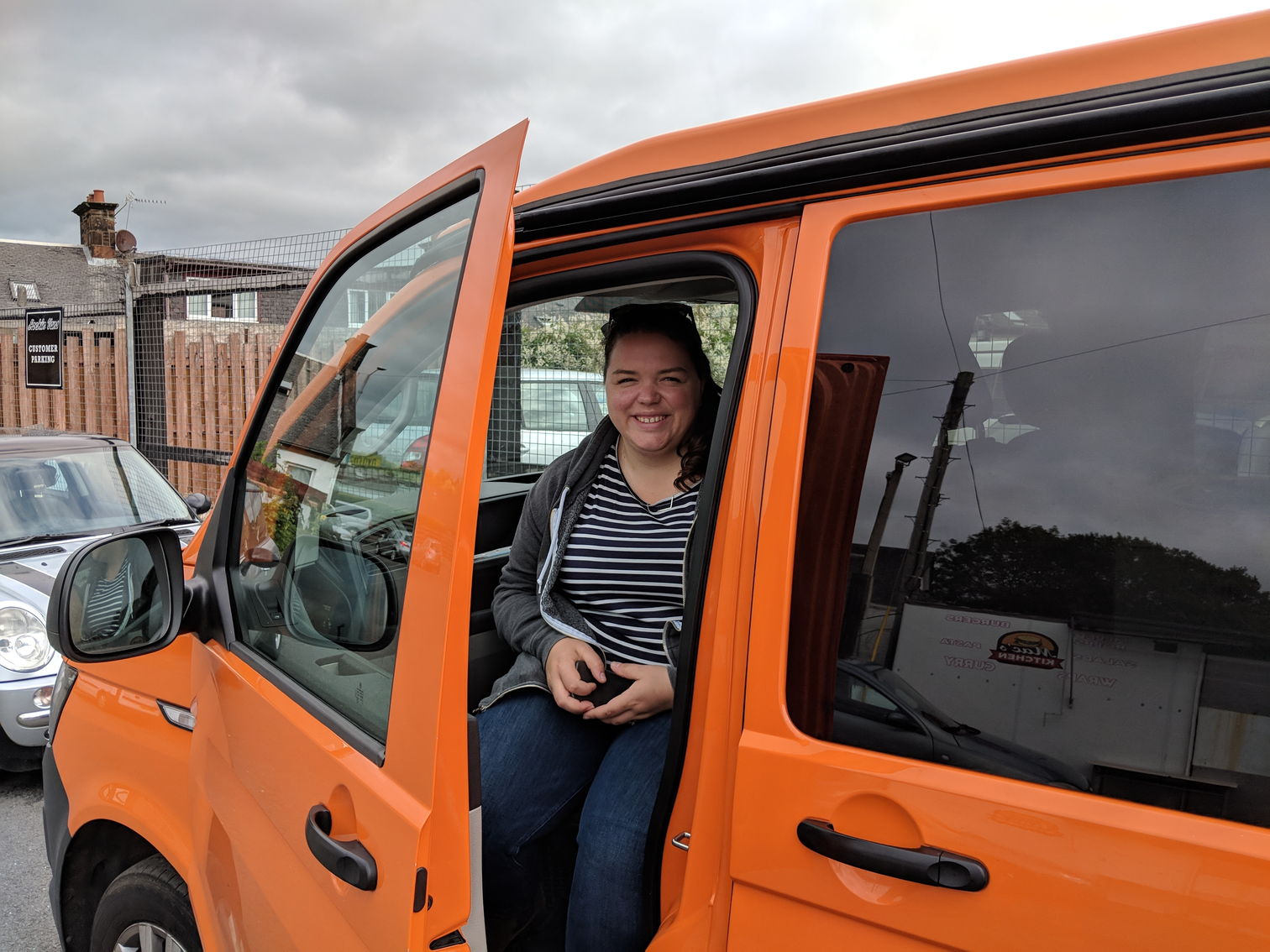 Alex sitting in the campervan one last time