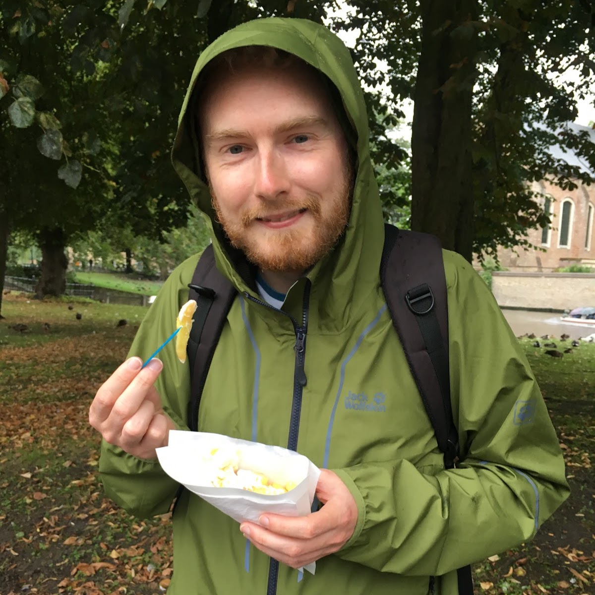 Me eating chips and mayo with my hood up in Bruges