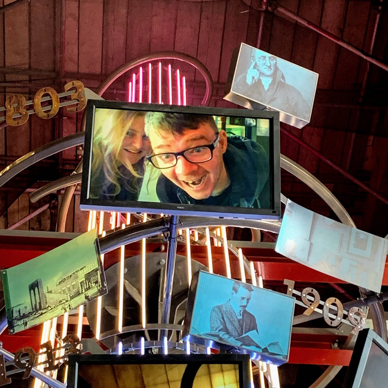 Lucy and Richard on a monitor