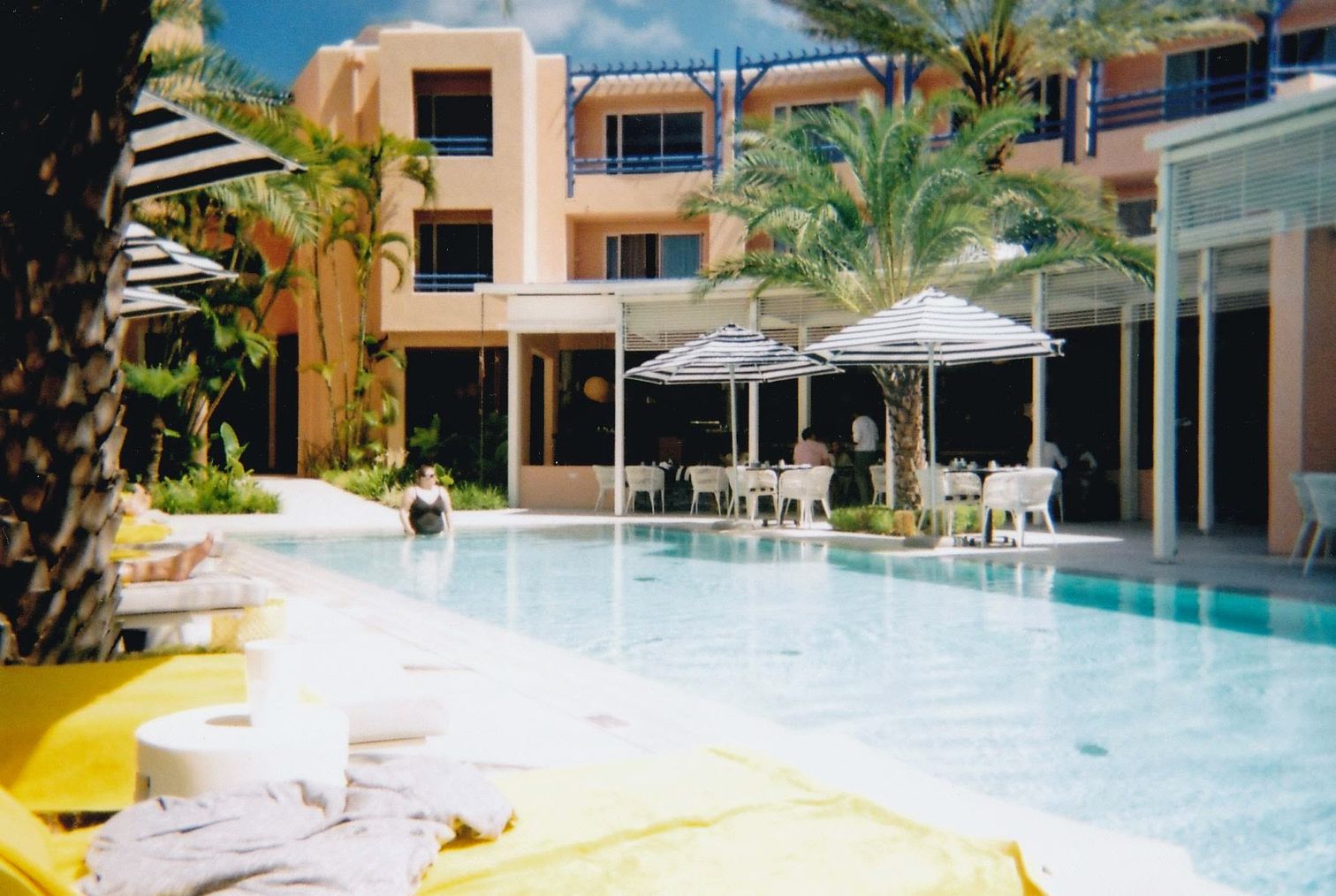 Alex in the pool (taken on the disposable camera)