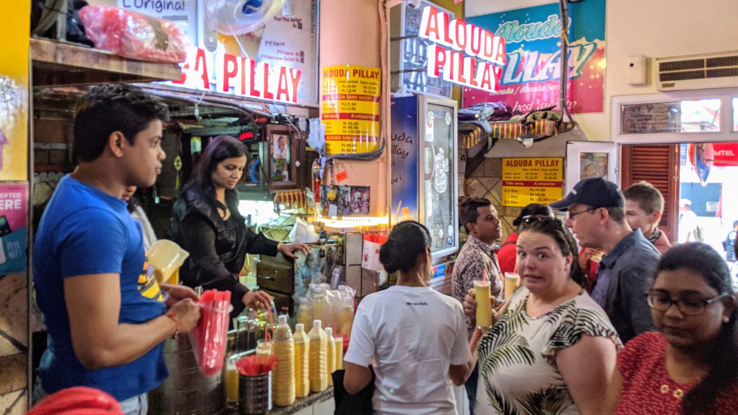 Alex waiting at a stall selling alouda