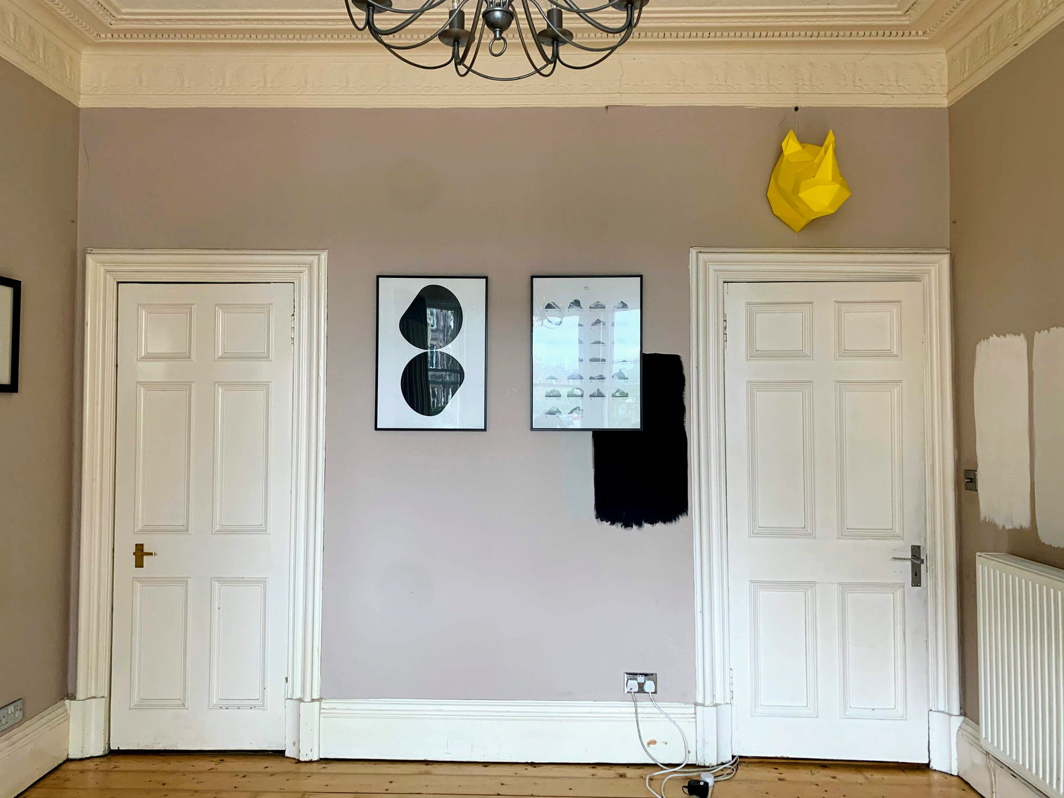 The old living room, with test patches on the wall