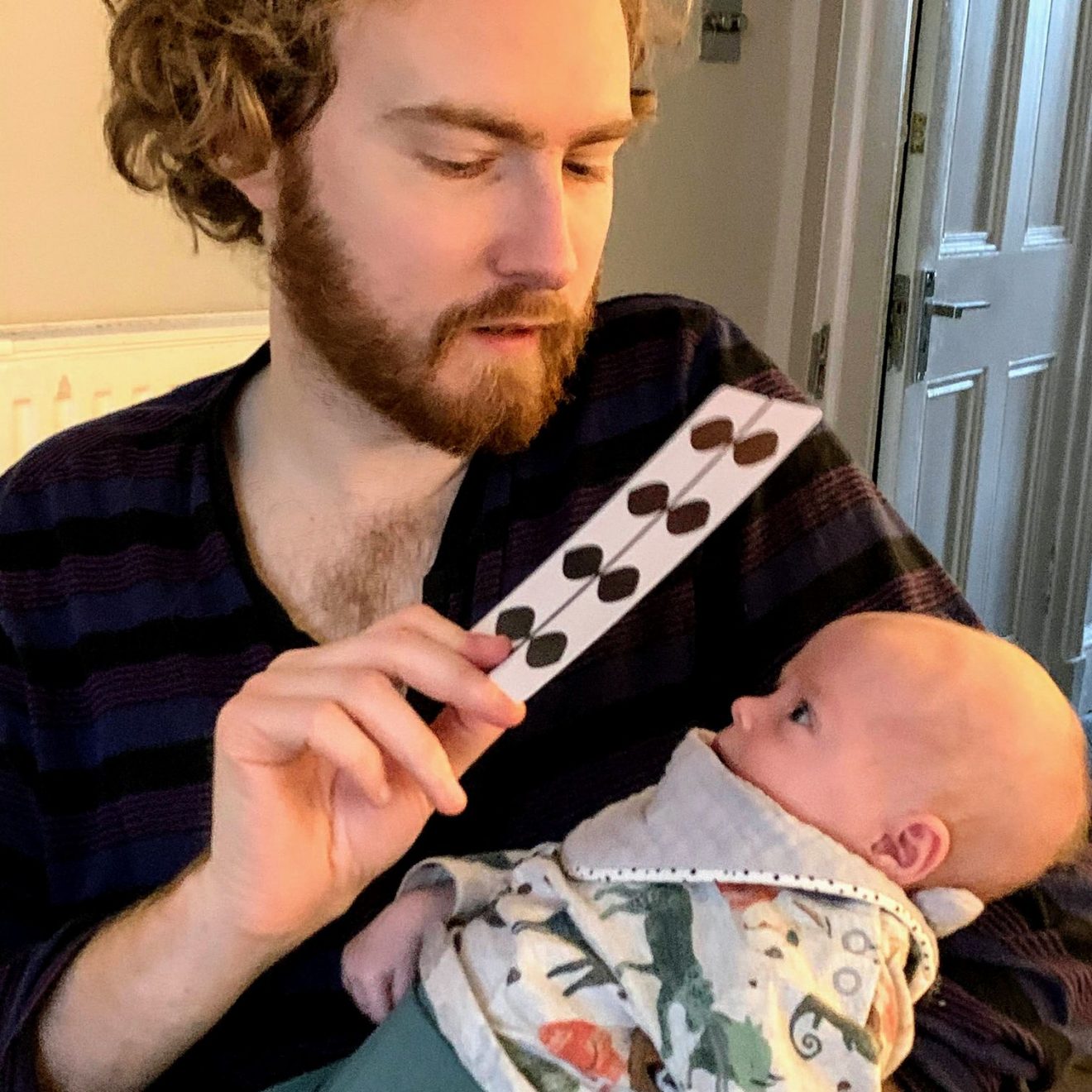 Me showing Izzy a flash card
